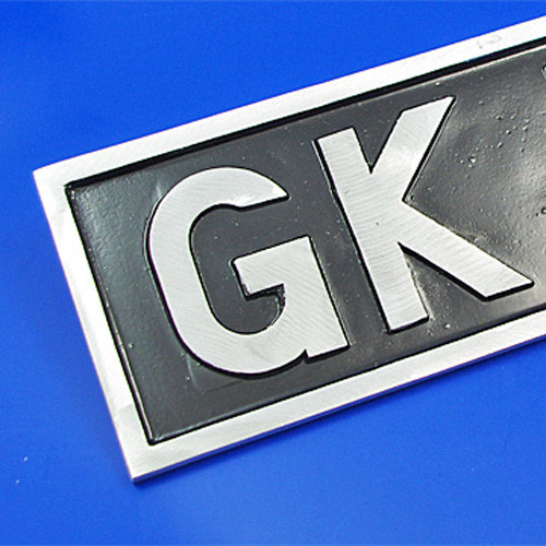 Cast aluminium number plate - Cast, painted and linished