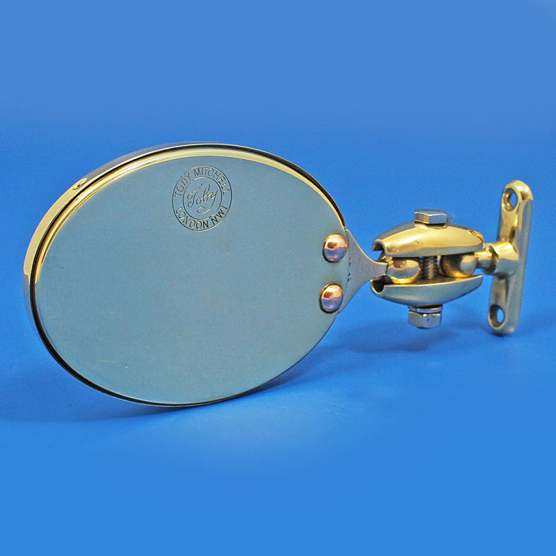Oval rear view mirror - Equivalent to Desmo 263 model, stamped 'Toby' - Stamped oval mirror in polished brass finish